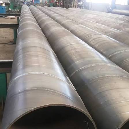 Spiral welded industrial steel pipes at factory